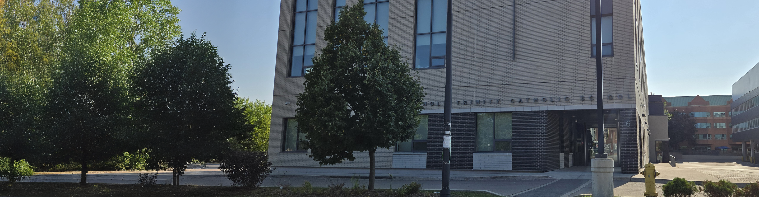 A photo of the front entrance of the Holy Trinity Catholic School.