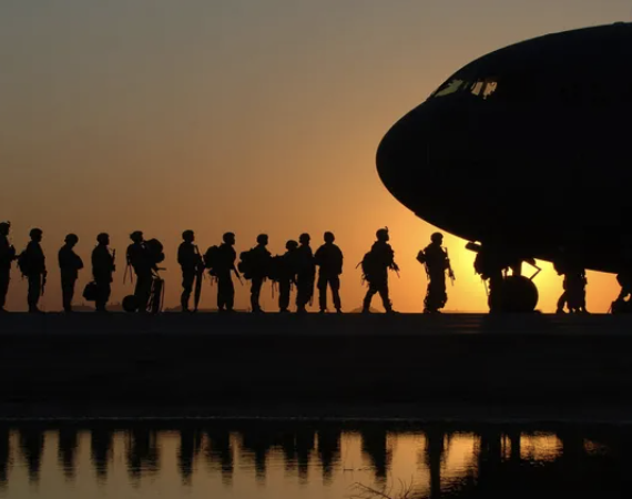 military about to get on plane