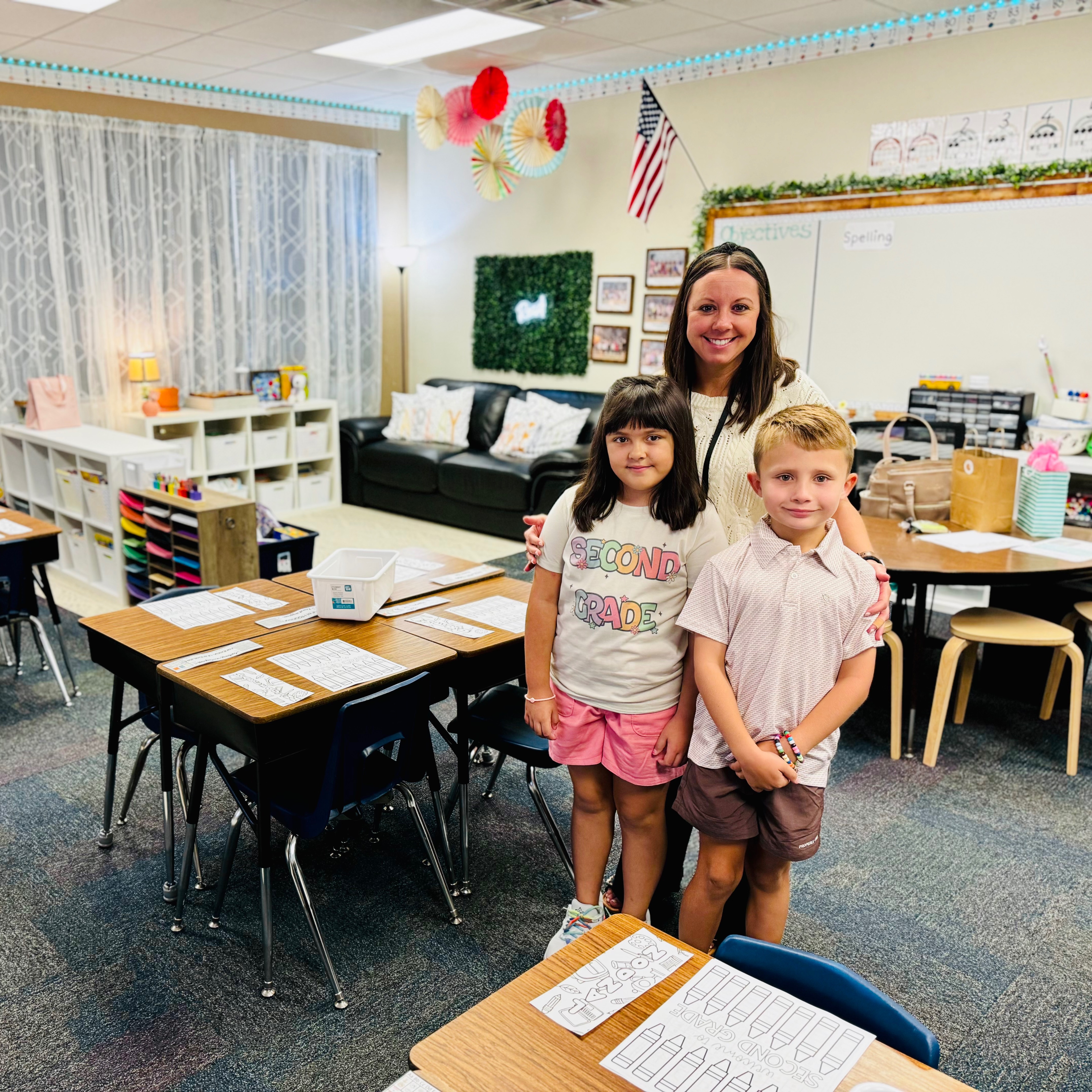 Teacher and two students in a classroom 