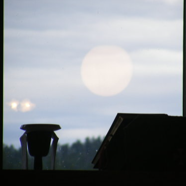 The rising sun and silhouetted items