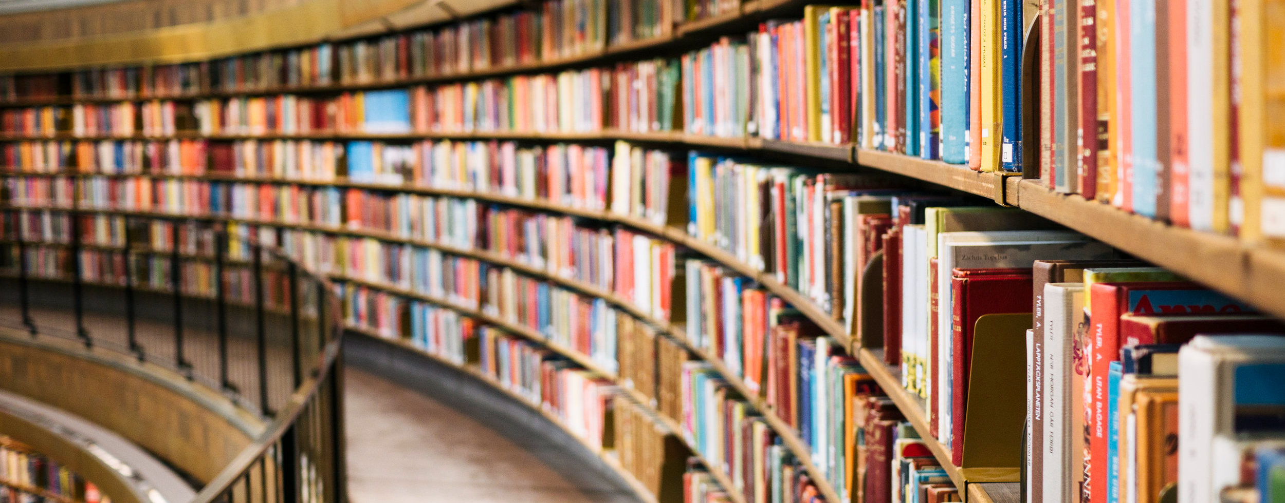 A curved library shelf