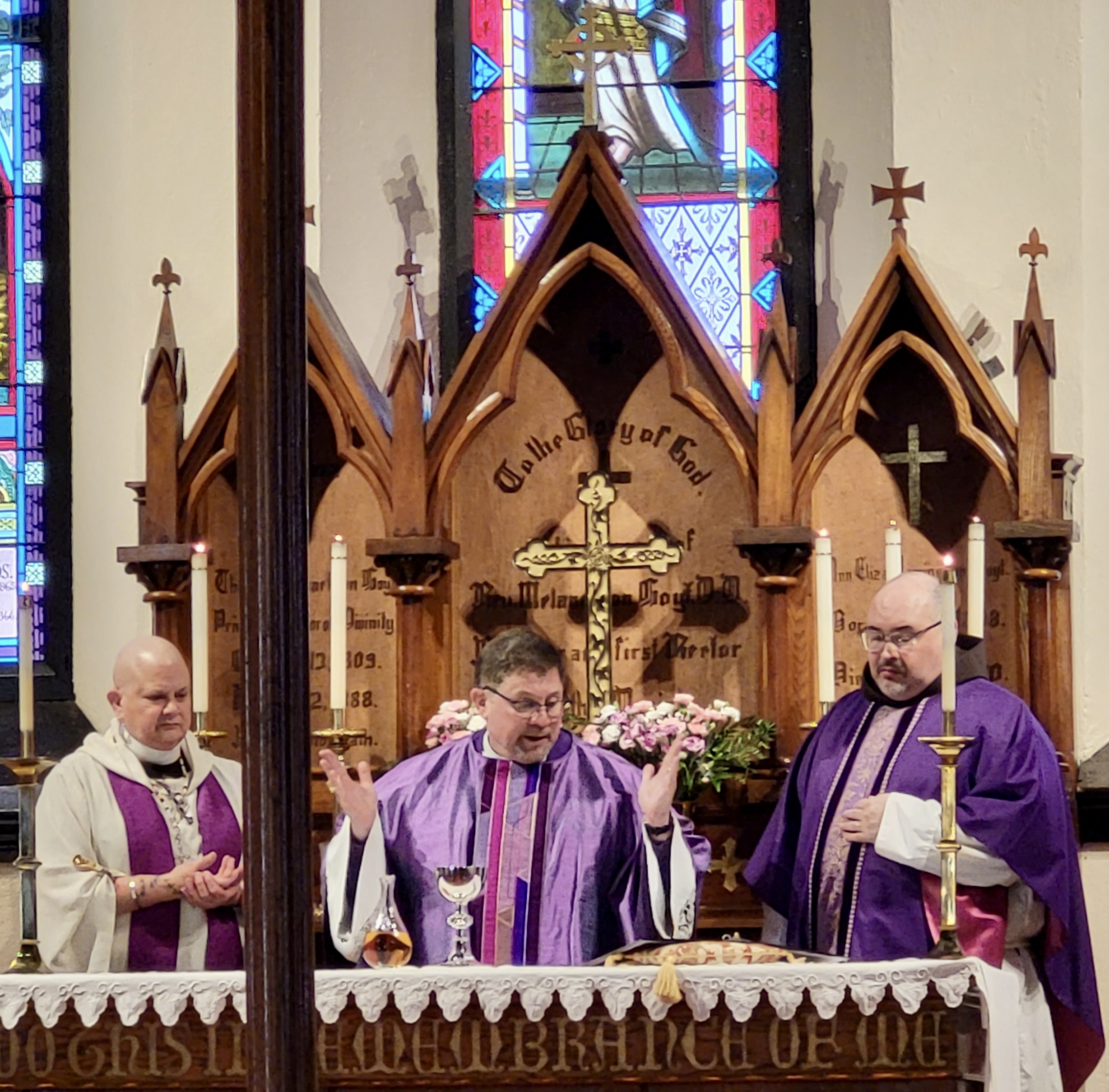 Bishop Folts celebrates the Eucharist with Canon Stanley and Fr. Newago.