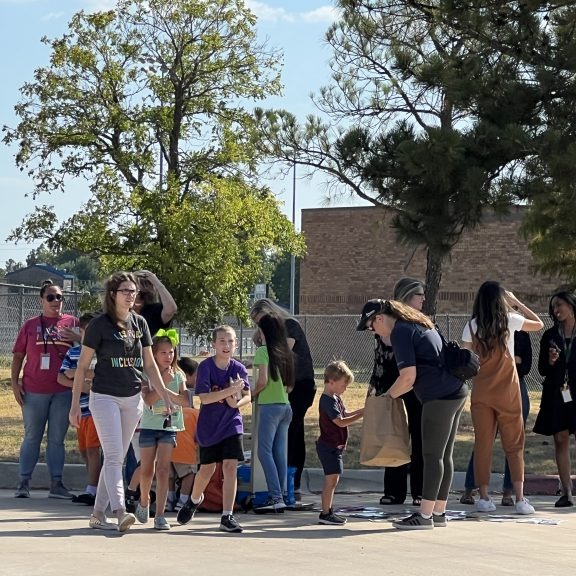 Kids with candy bags outside 