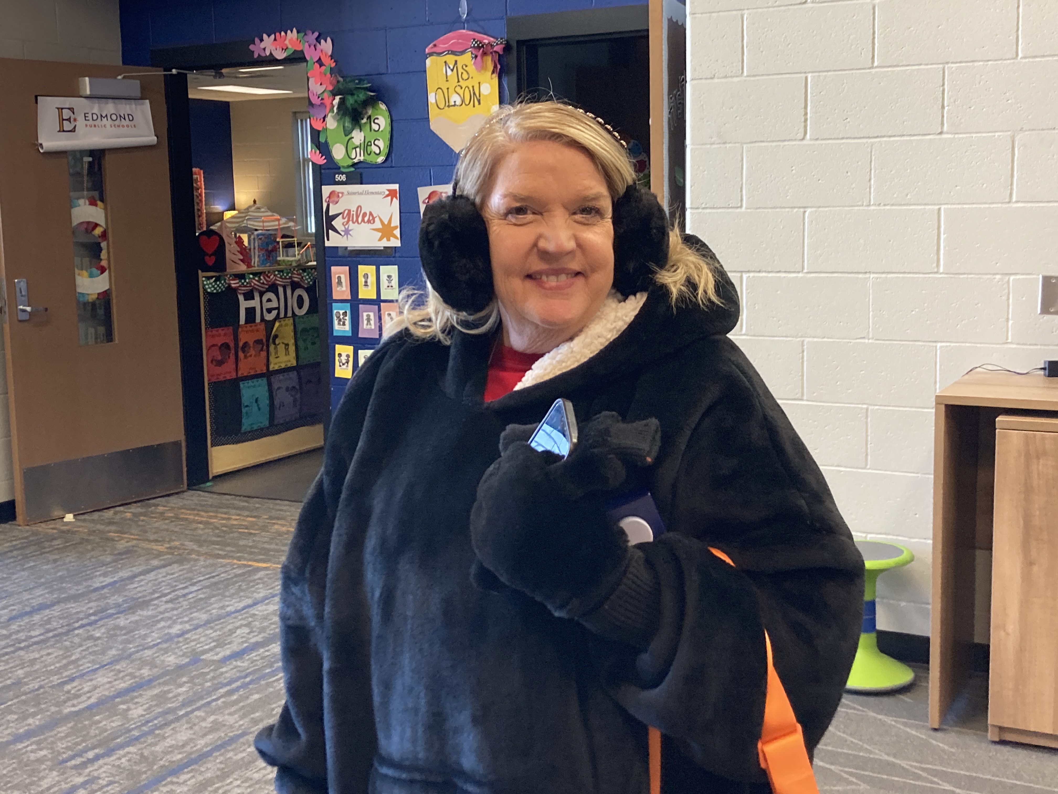 kindergarten teacher in winter wear