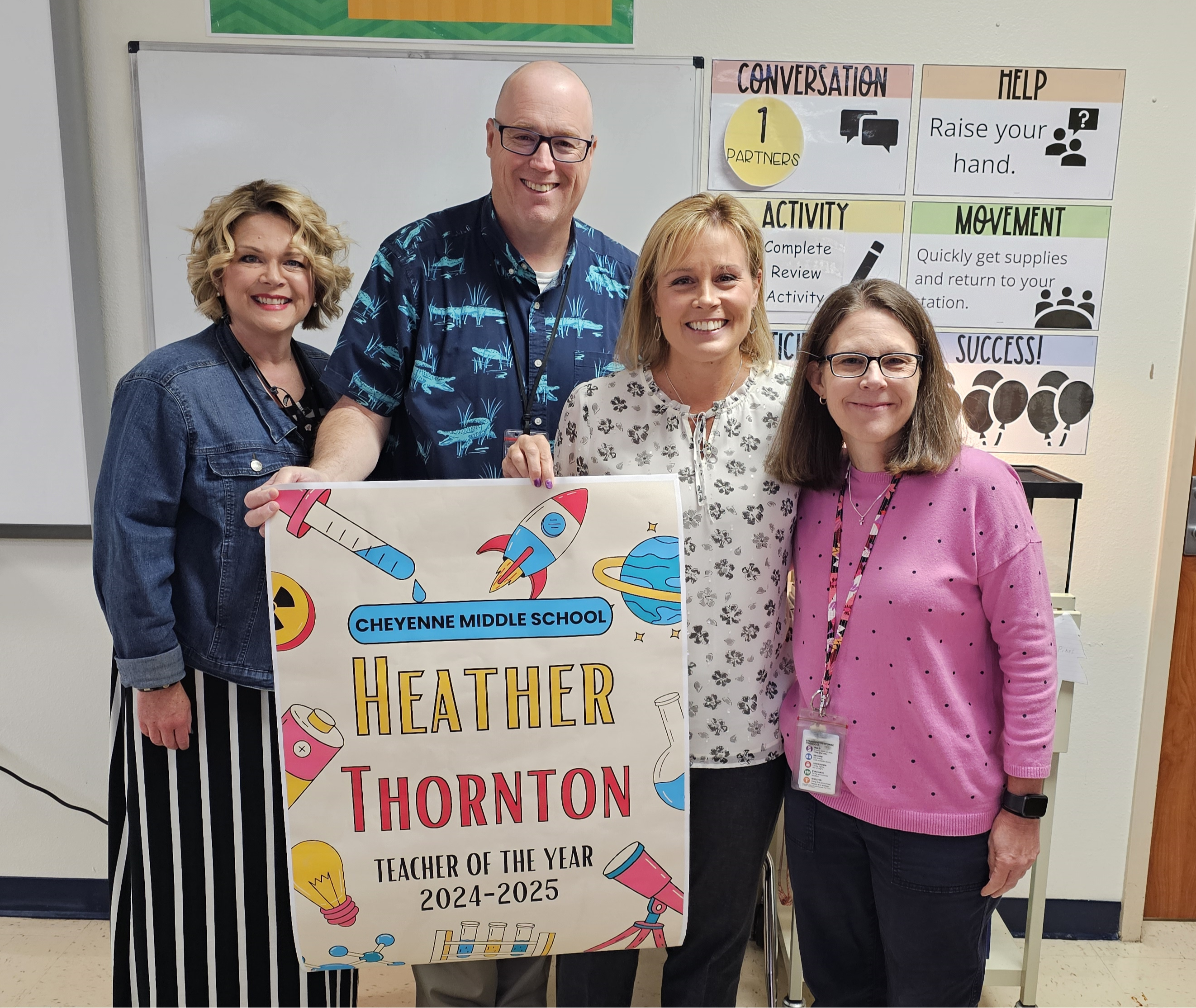 teacher of the year with three administrators