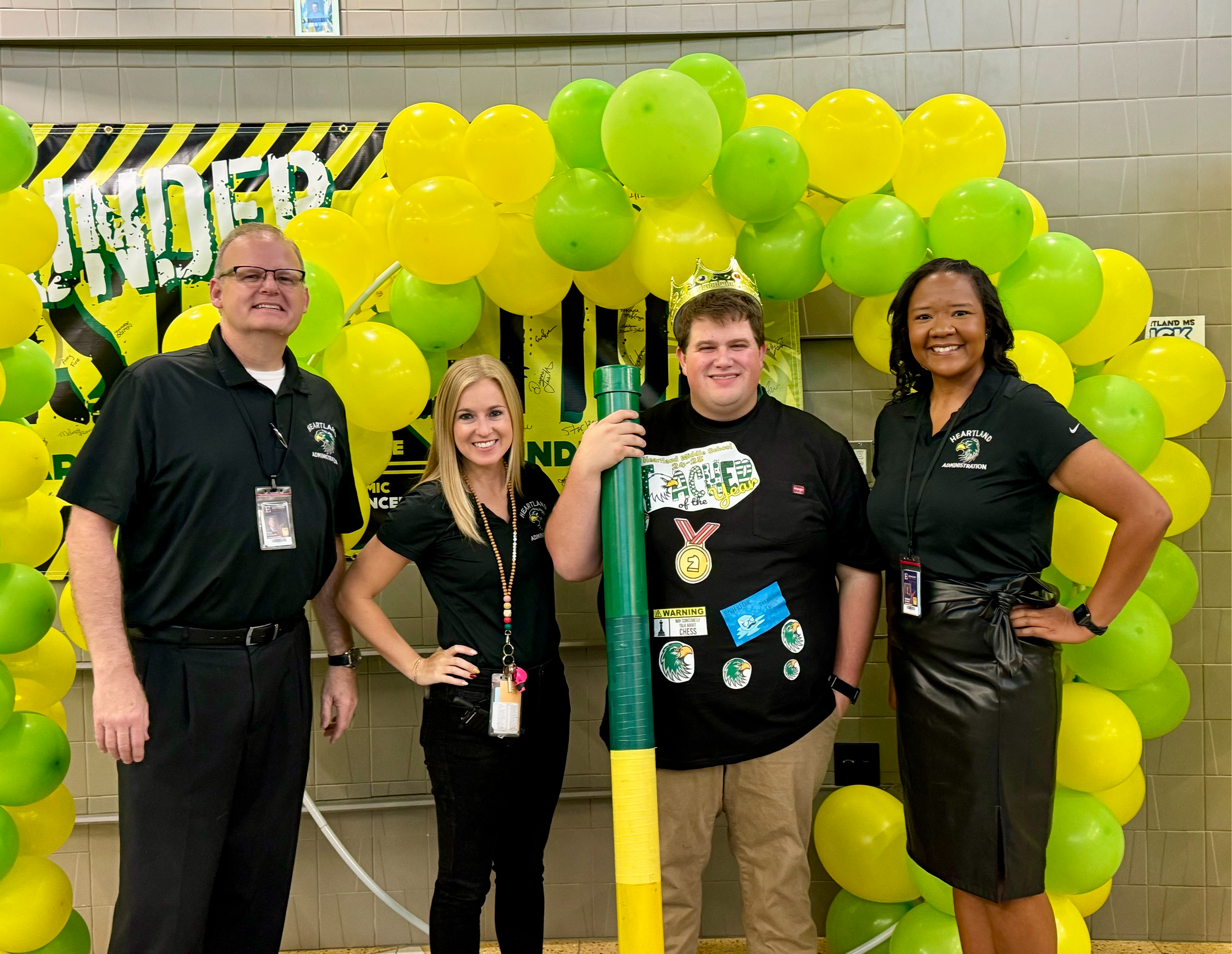 Teacher of the Year Shane Hohn with Heartland principals