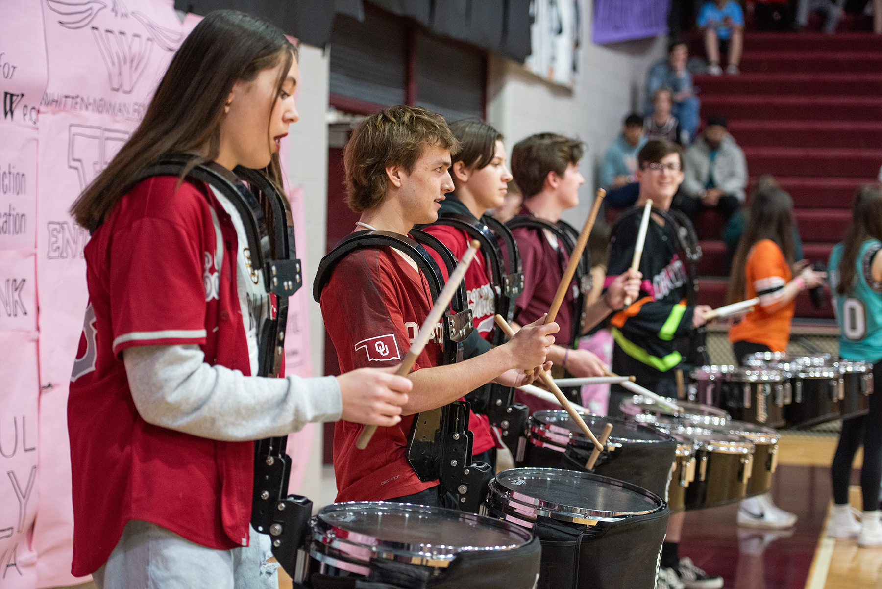 edmond memorial band members play during a swine week assembly