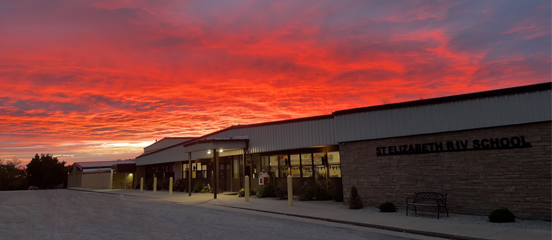 Front of school during sunrise