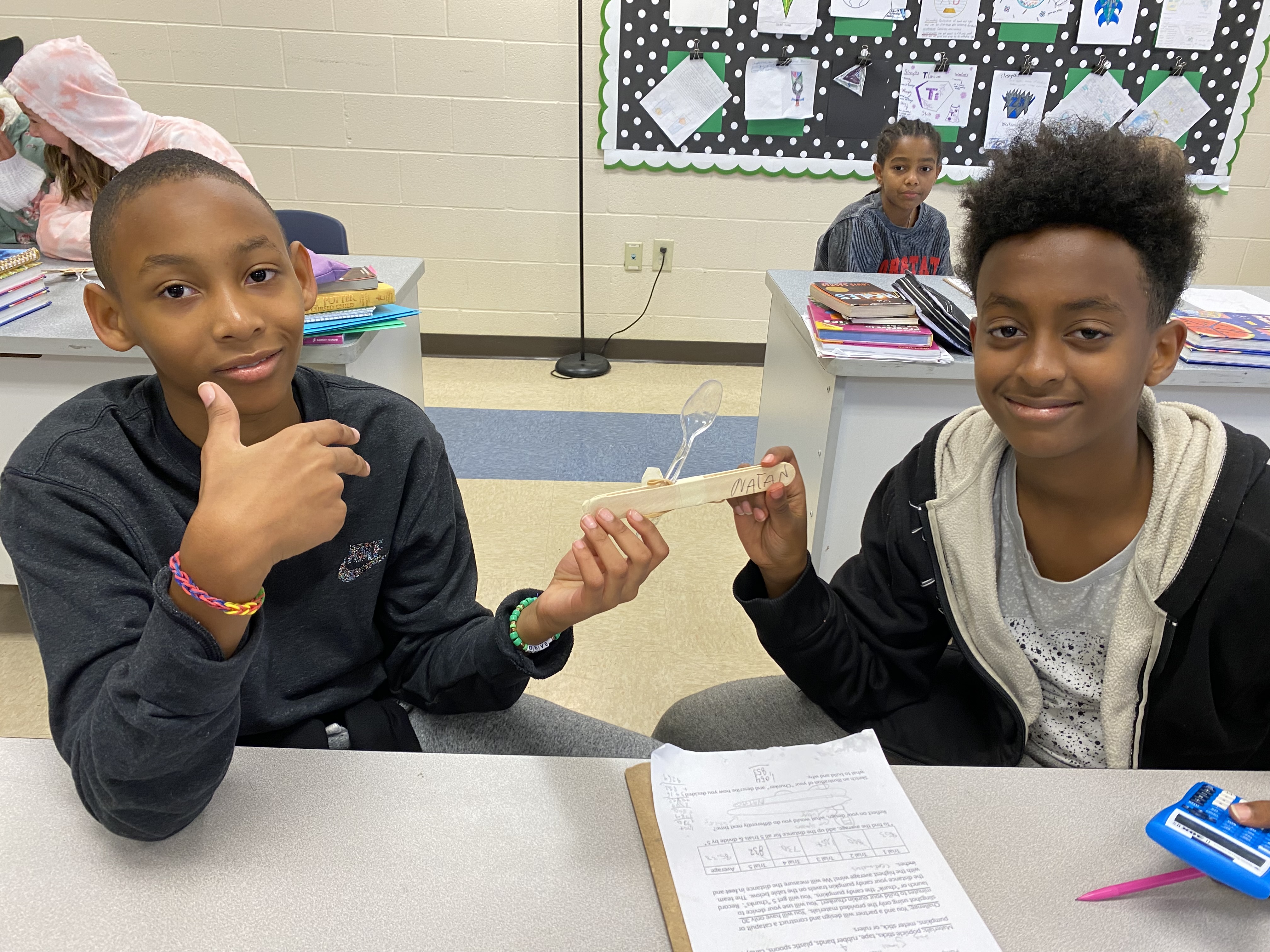 students sitting at table