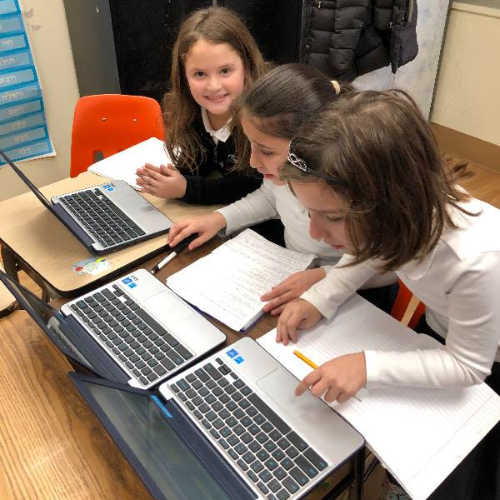 students using laptops