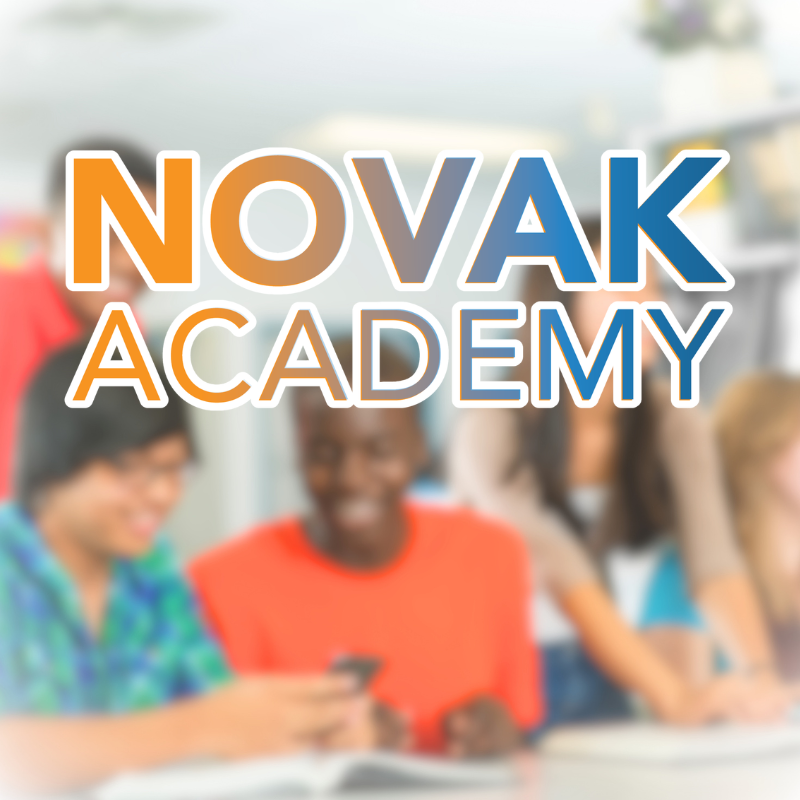 A group of students in a classroom, some seated, some standing, with text overlay reading "NOVAK ACADEMY".