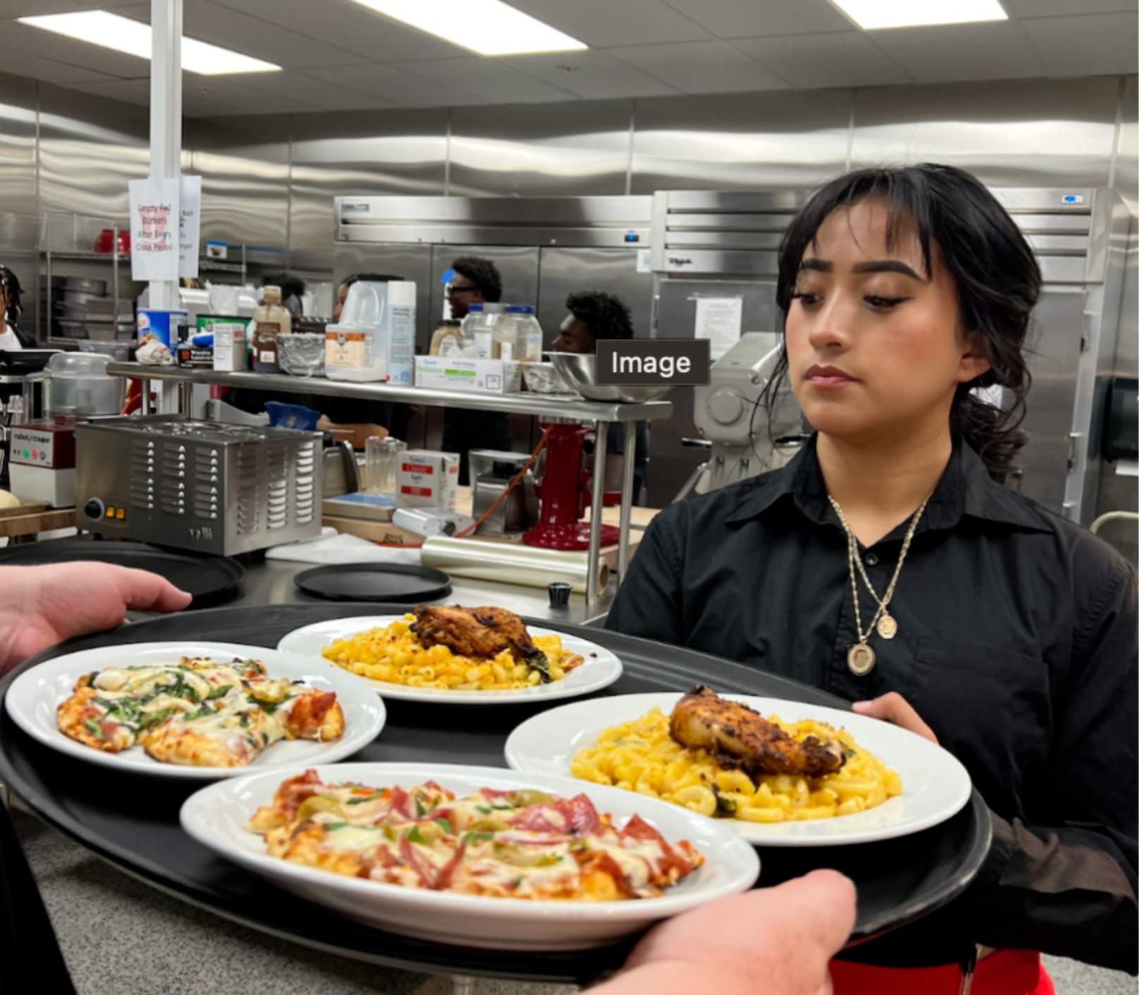 Student serving food