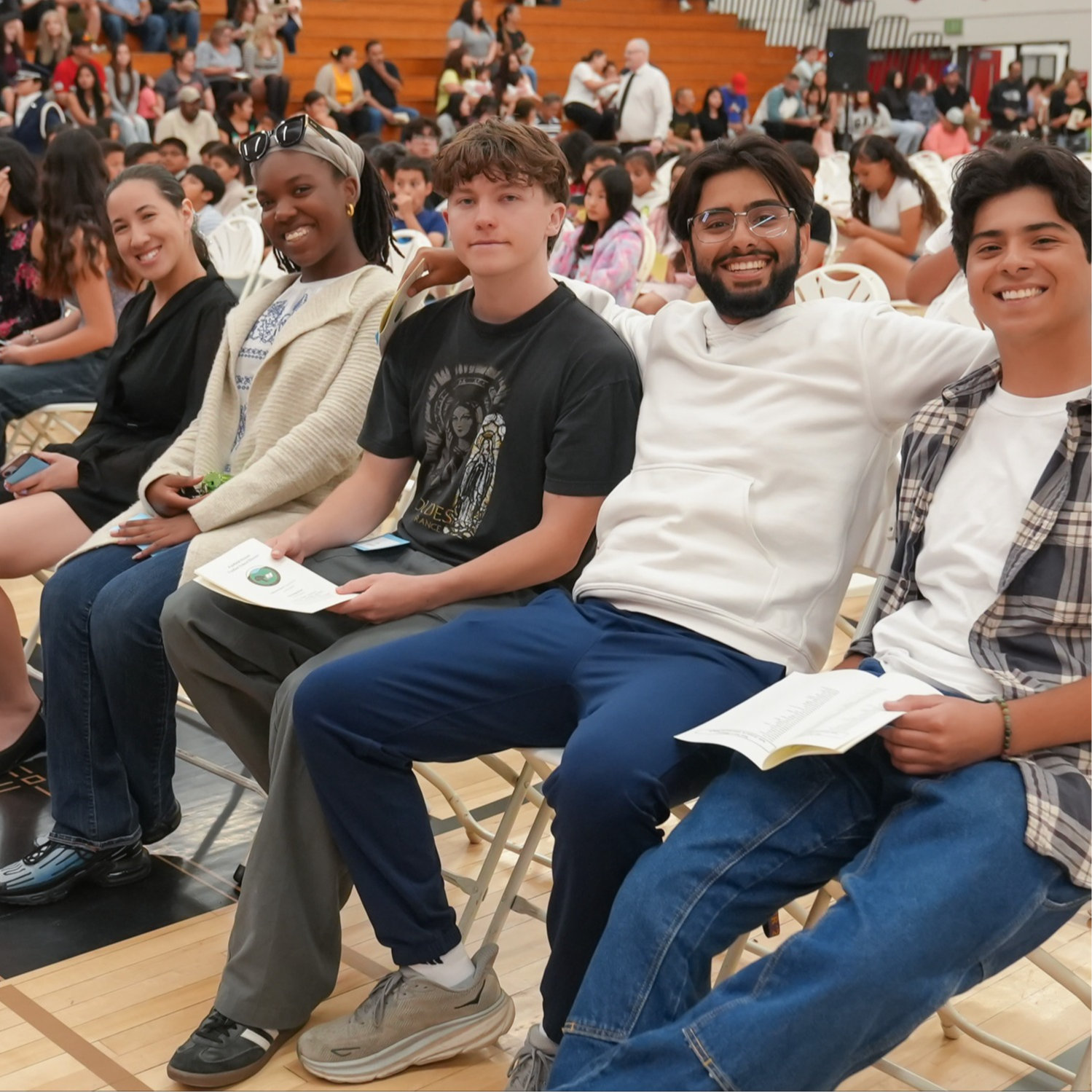 A group of high school kids at the English Proficiency Ceremony posing for a photo