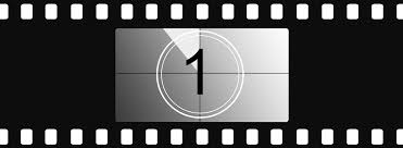 black and white countdown showing 1 second left set within a black and white film strip
