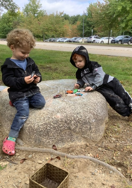 children on big rock