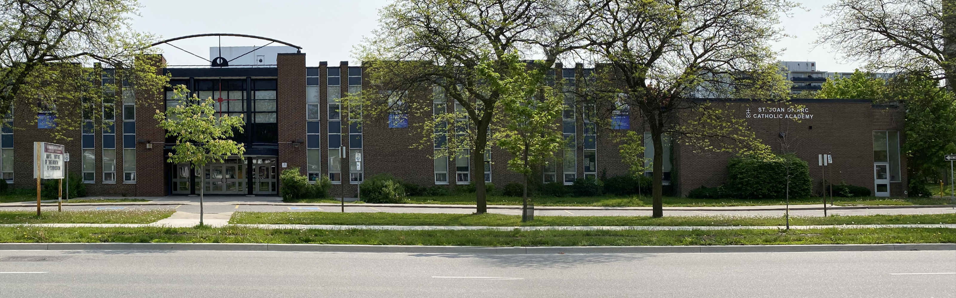 The front of the St. Joan of Arc Catholic Academy school building