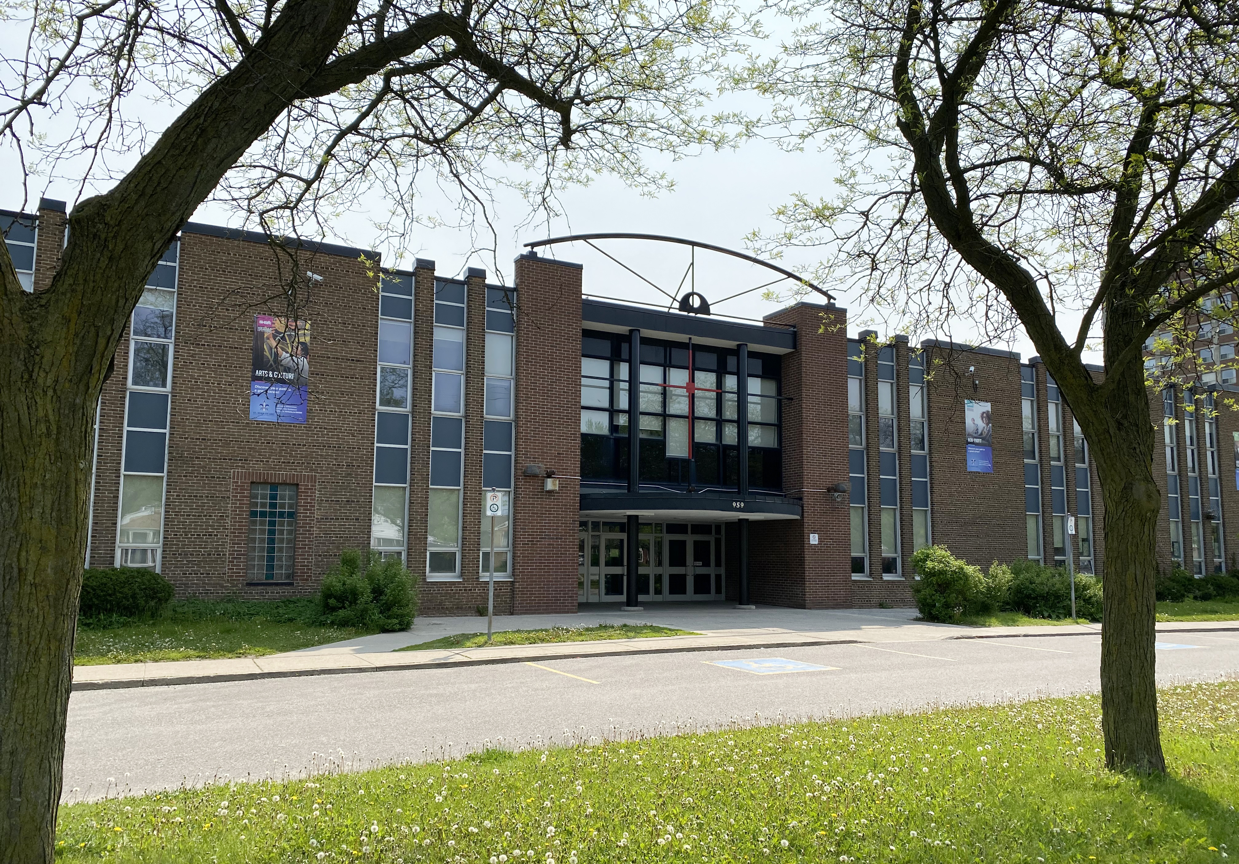 The front of the St. Joan of Arc Catholic Academy school building