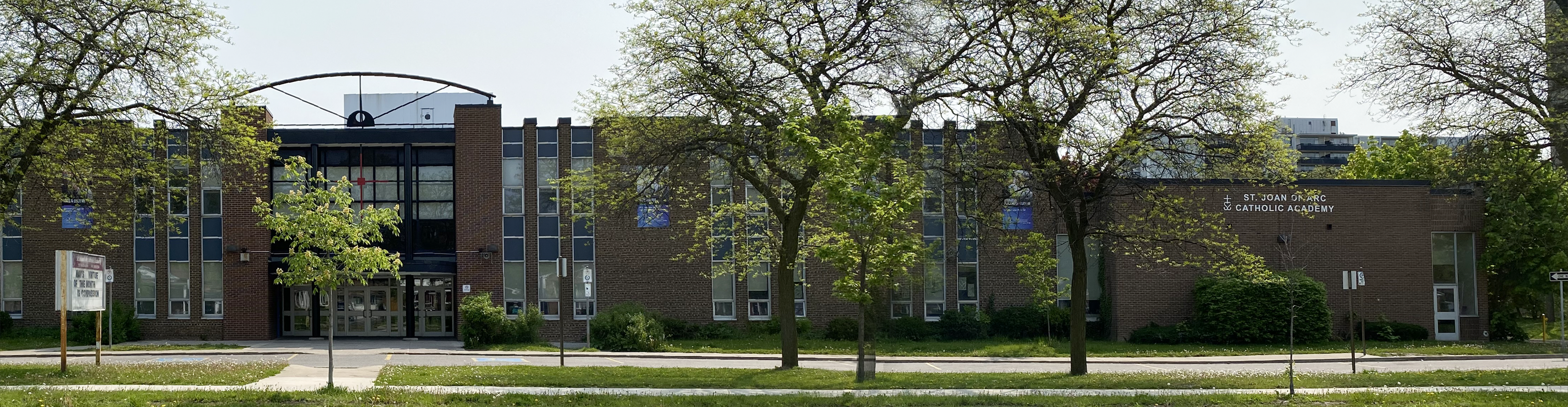 The front of the St. Joan of Arc Catholic Academy school building