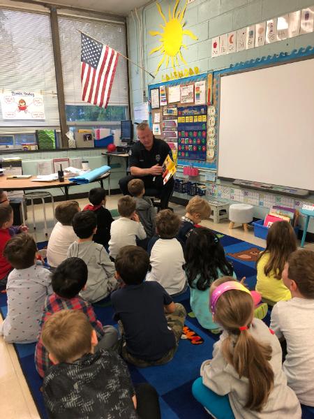 Officer Smith Reading to students