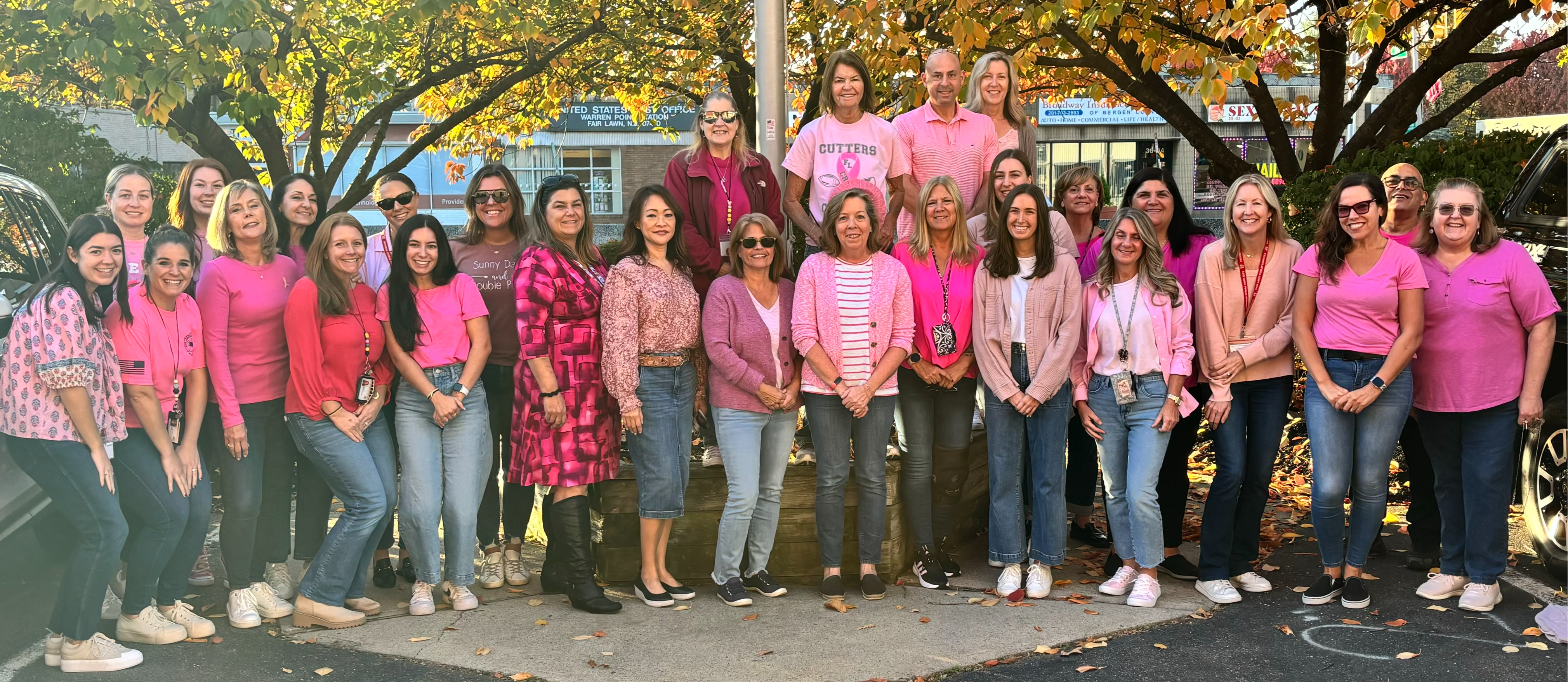 staff wearing pink for breast cancer awareness