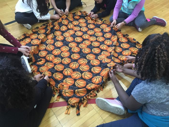 students making a blanket