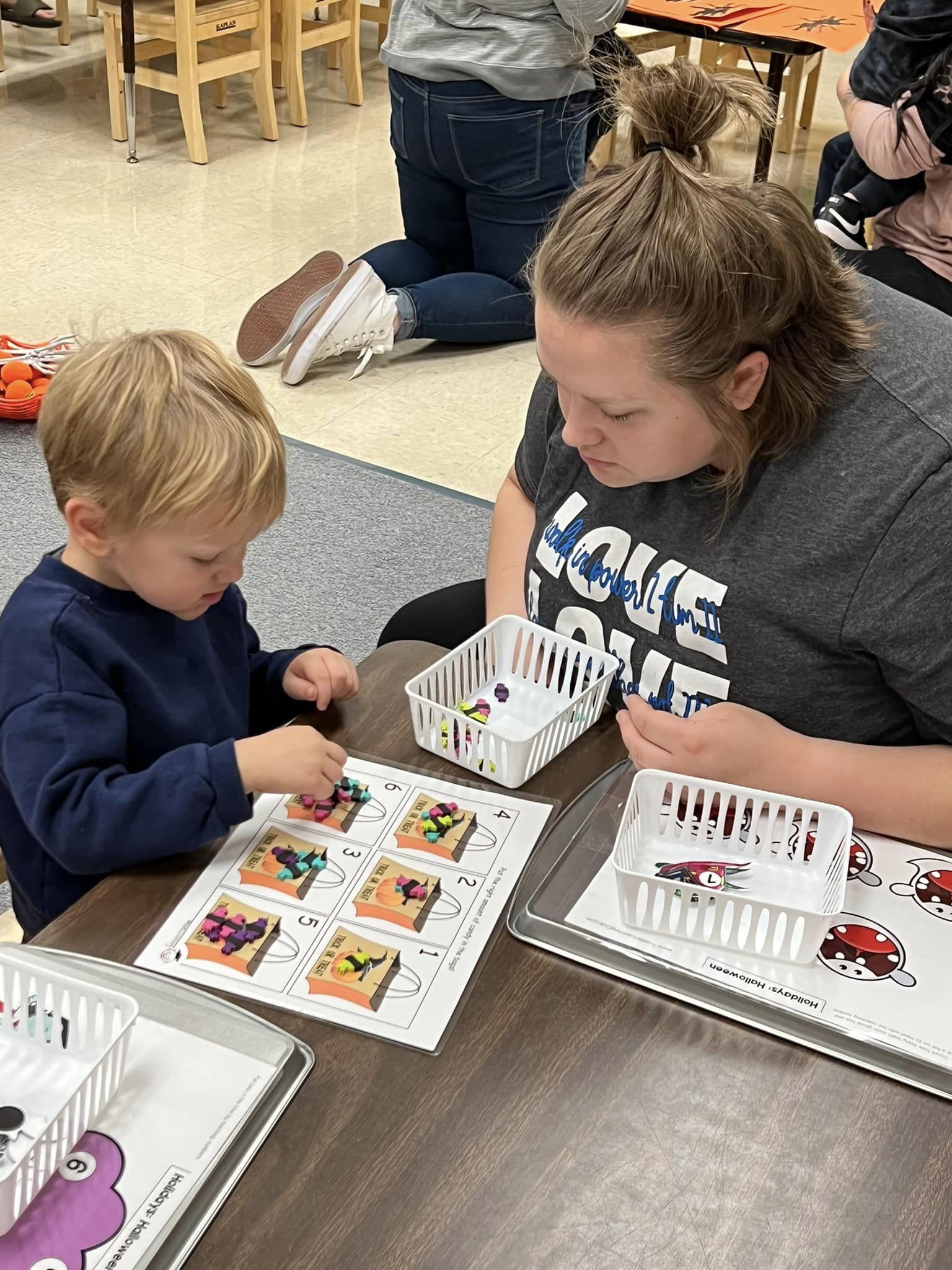 Student and teacher working on work