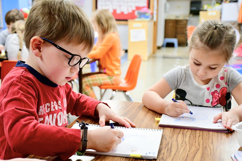 Preschool students working