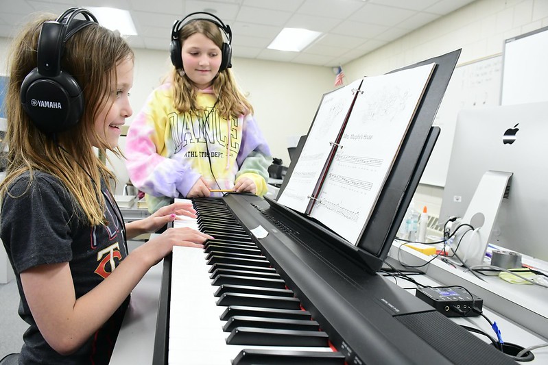 Students playing piano