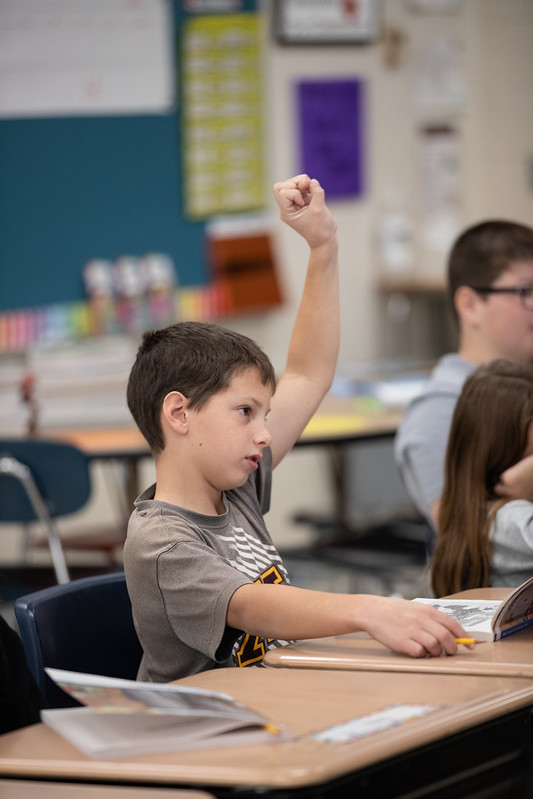 Student raising hand