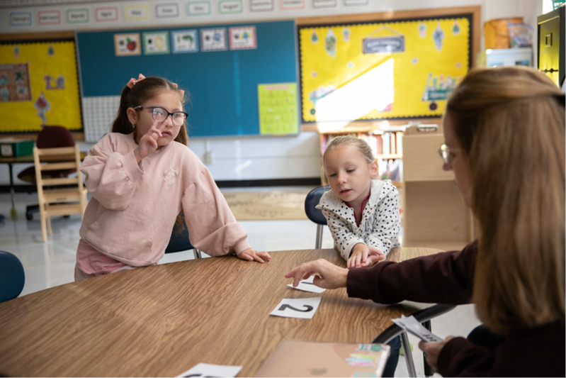 Teacher helping a student