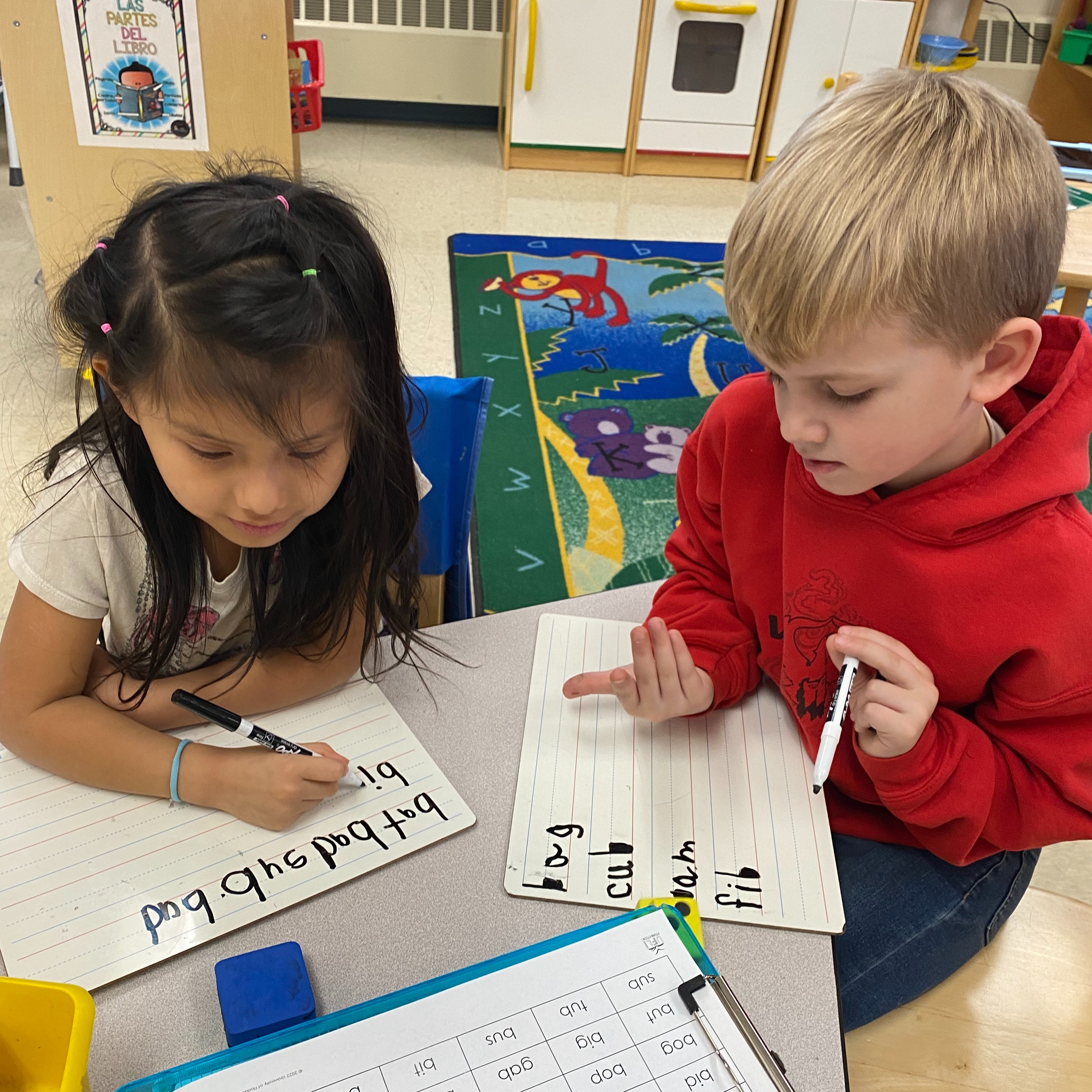Students working on words