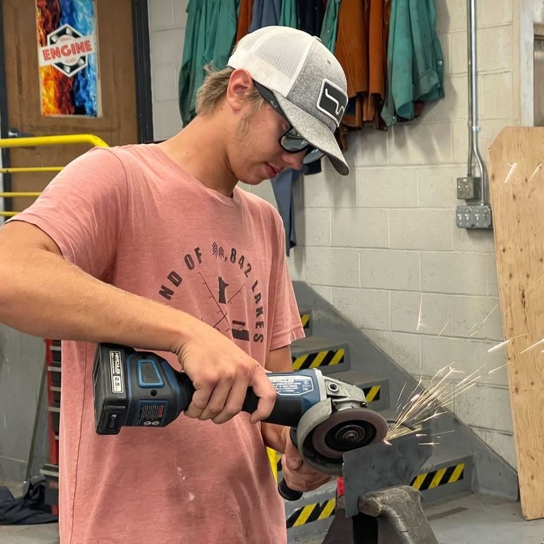 Student using tools