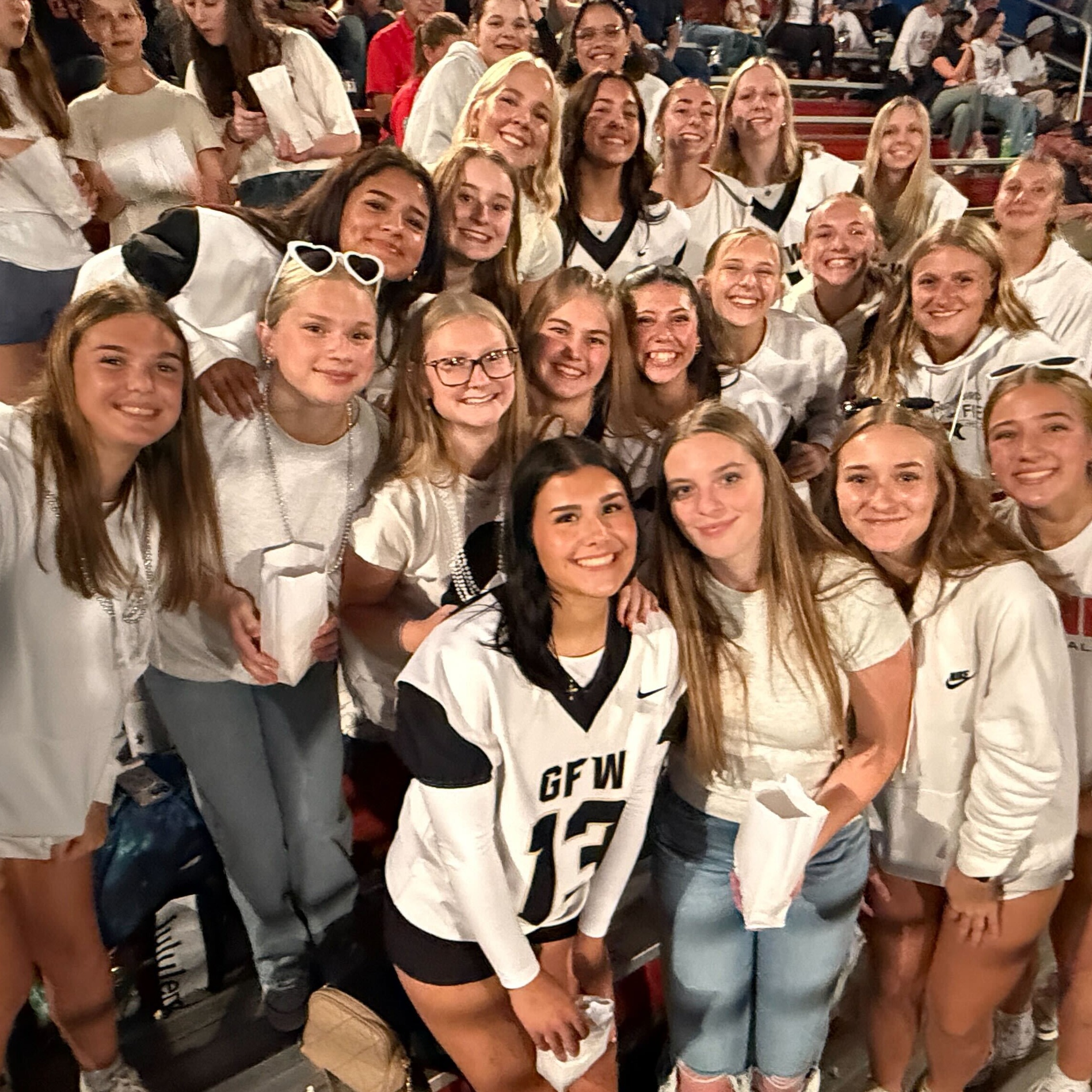group of girls at a football game
