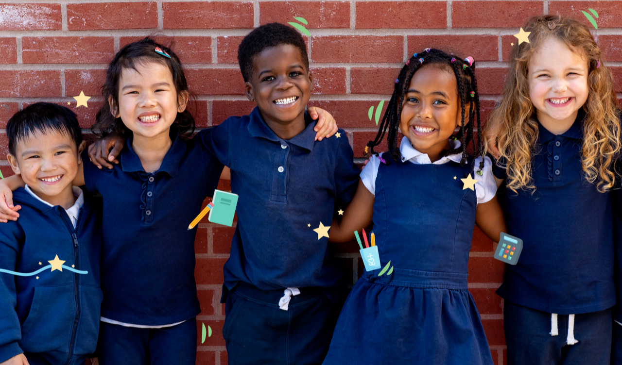 - An image of 5 children in Navy uniform standing in front of a brick wall smiling at the camera.