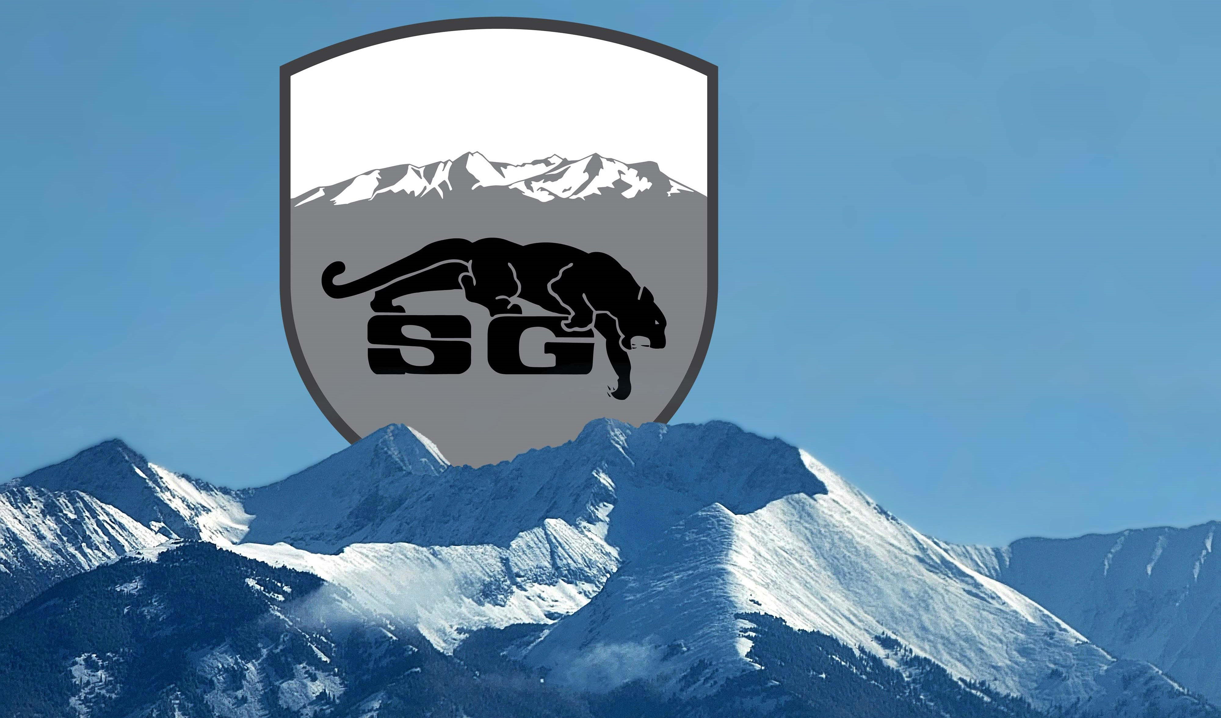 Snow cap mountains with school logo