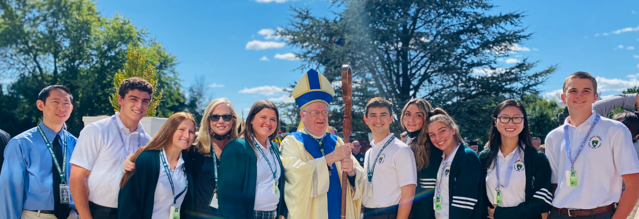 priest and students group picture