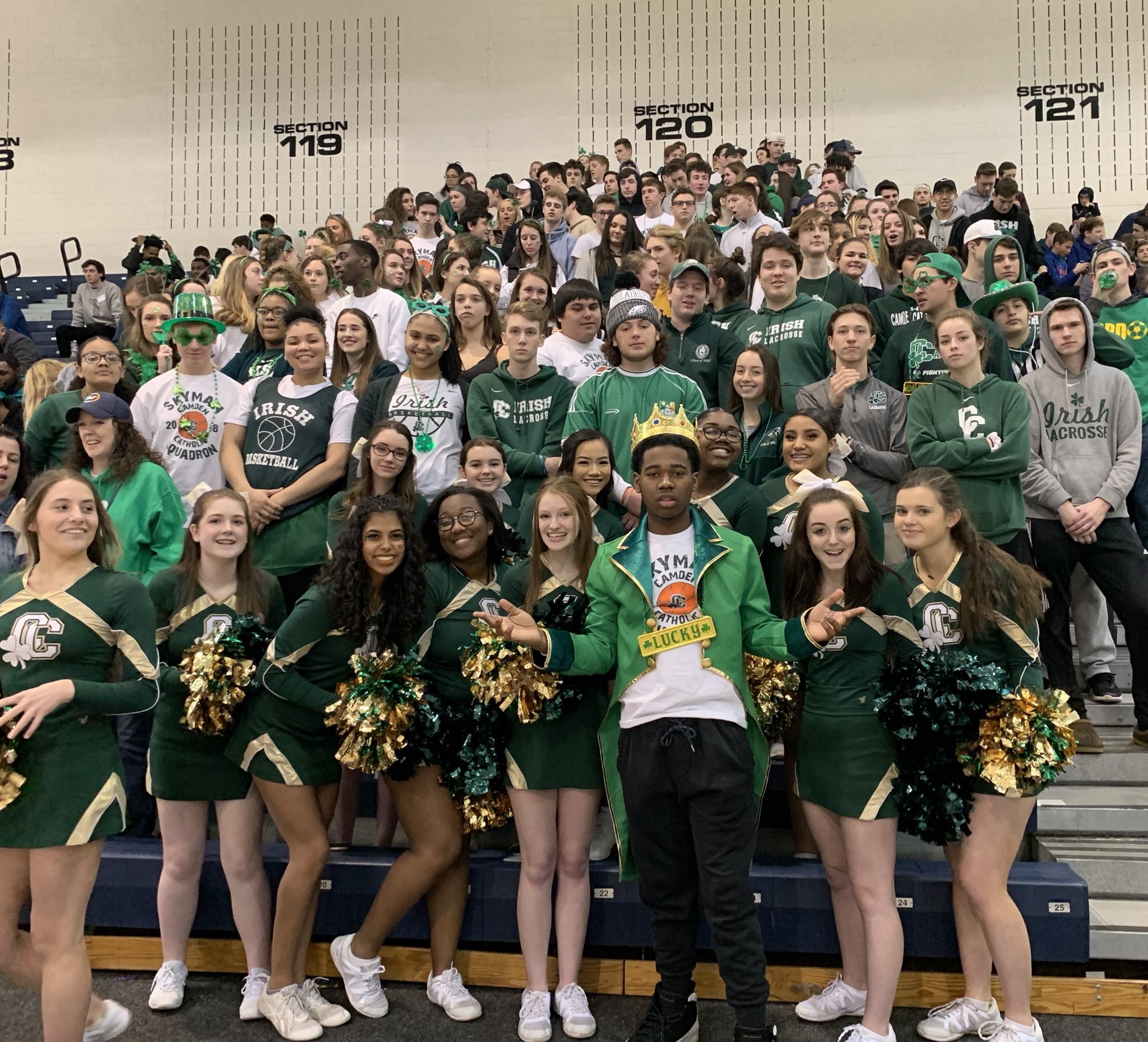 students at stands cheering