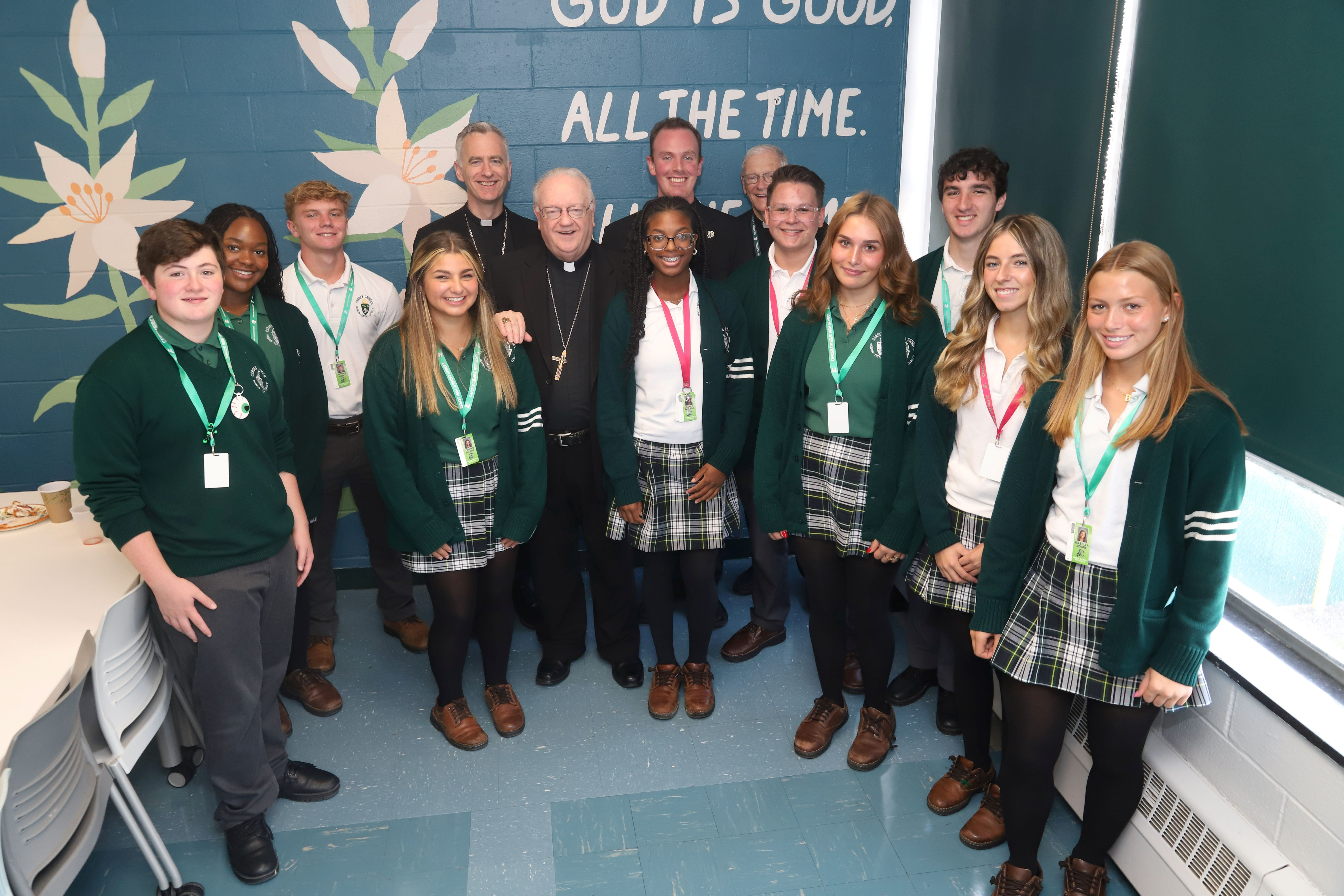 priest and students group picture