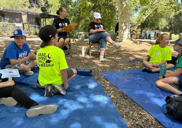 students on a tarp