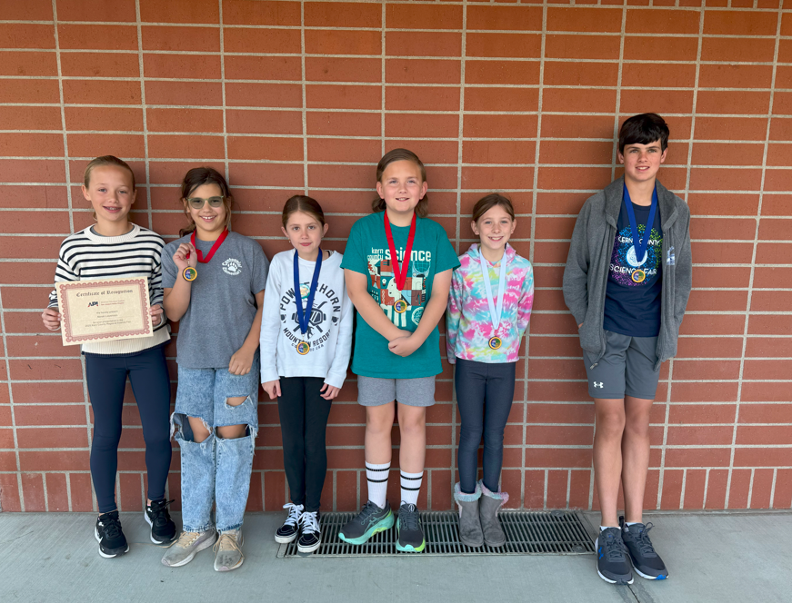 students with medals