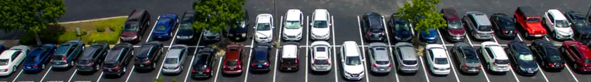 cars in parking spaces from arial