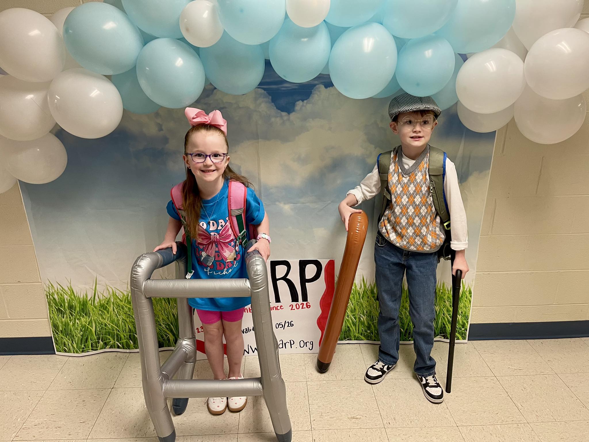 students dress as 100 years old for the 100th day of school