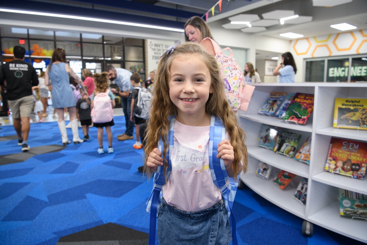 Photo of a student smiling for a camera