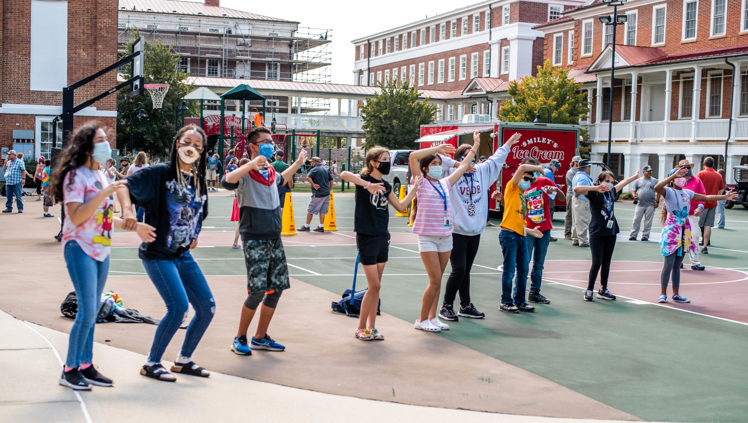 Students having fun outside at a ice cream social