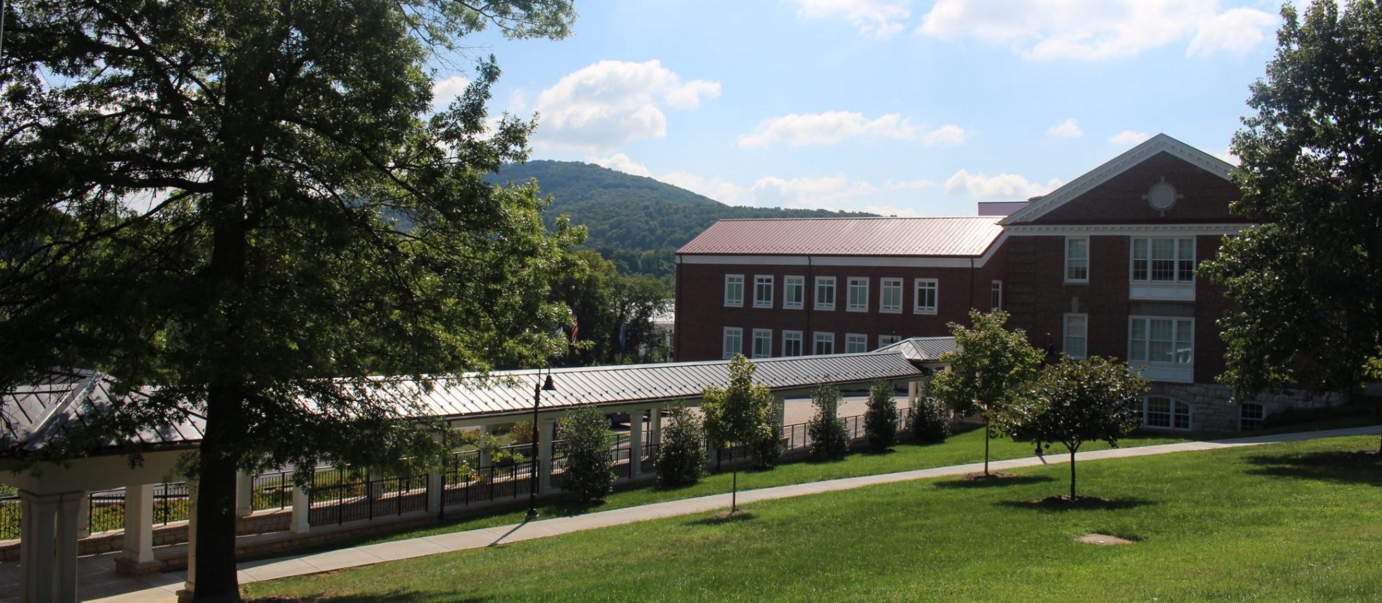 The Office of Public Safety building on a mostly sunny day