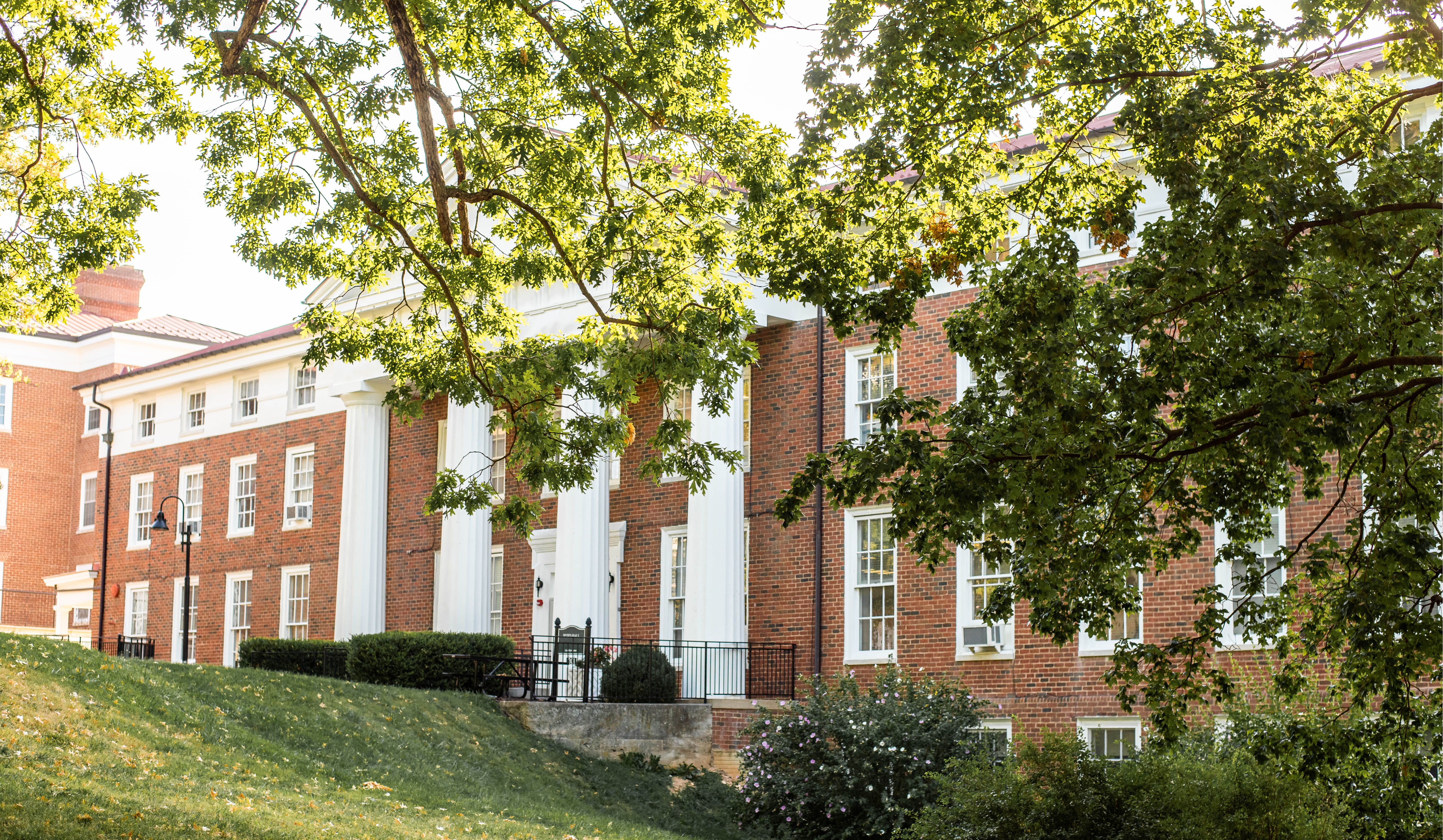 exterior of VSDB building. brick with white columns. 