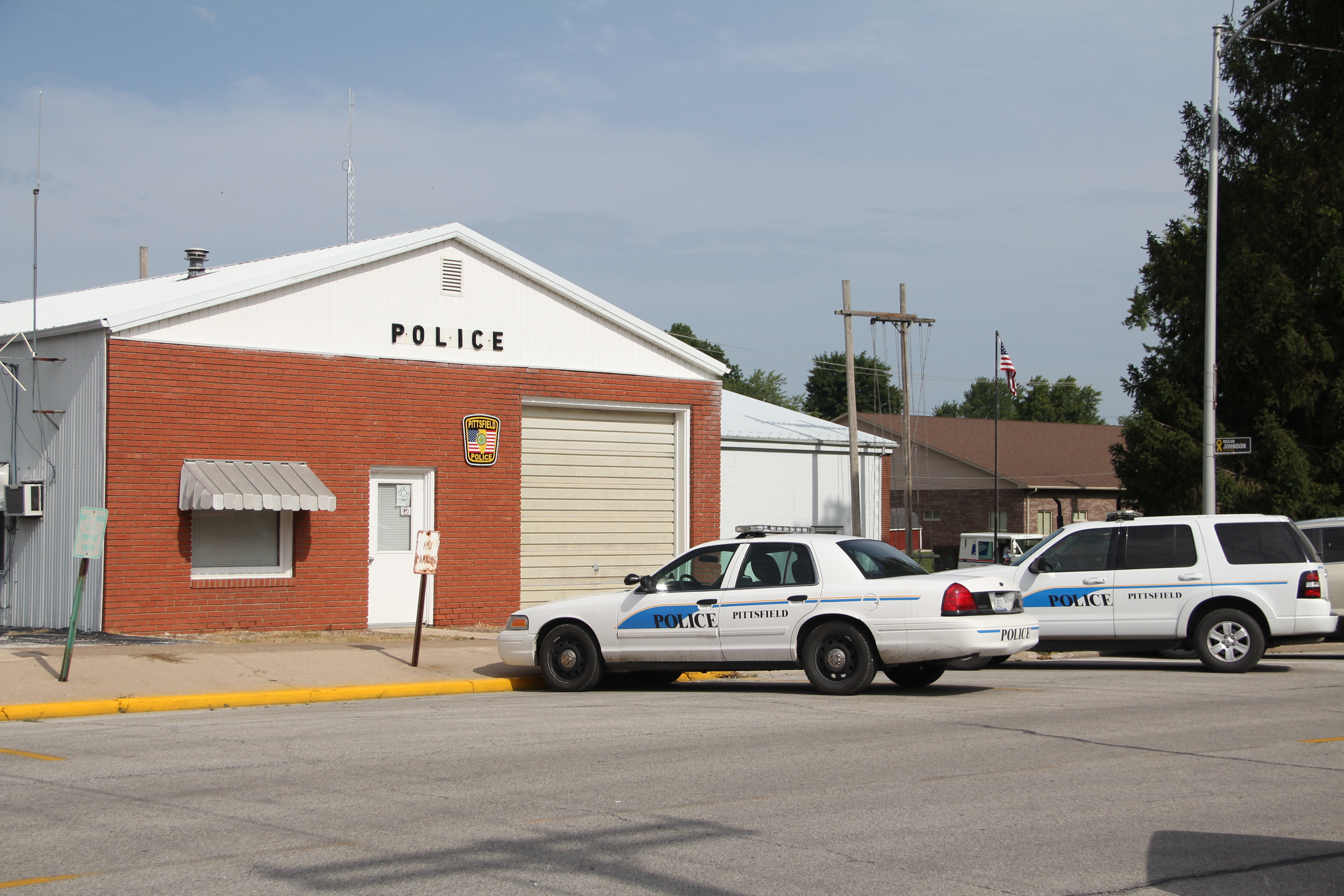 pittsfield police department building with police car outside