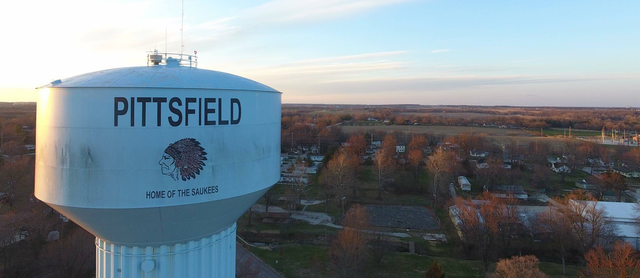 city of pittsfield water tower in foreground of area view of pittsfield