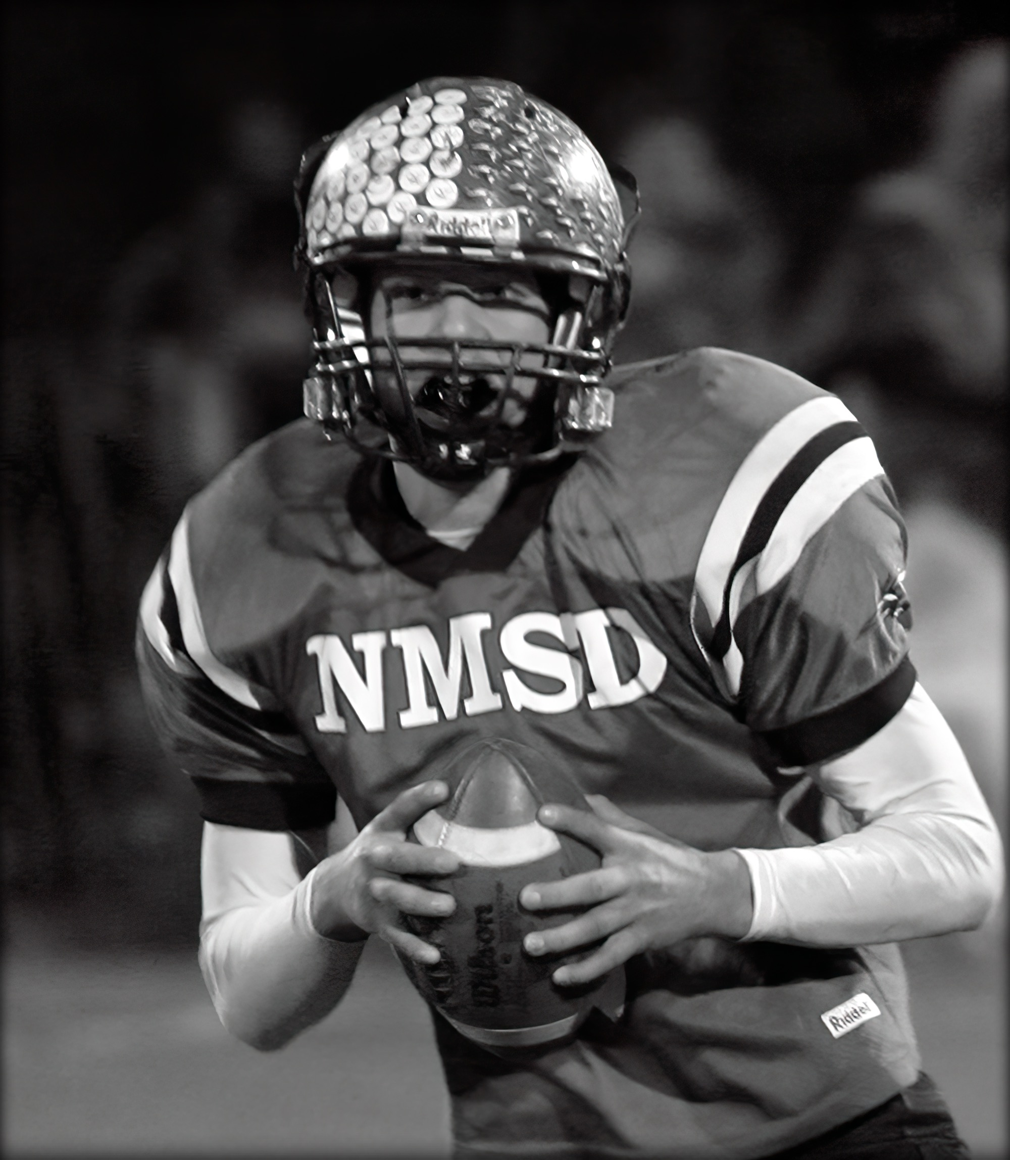 ,Wall of Famer Dustin Moulder with football