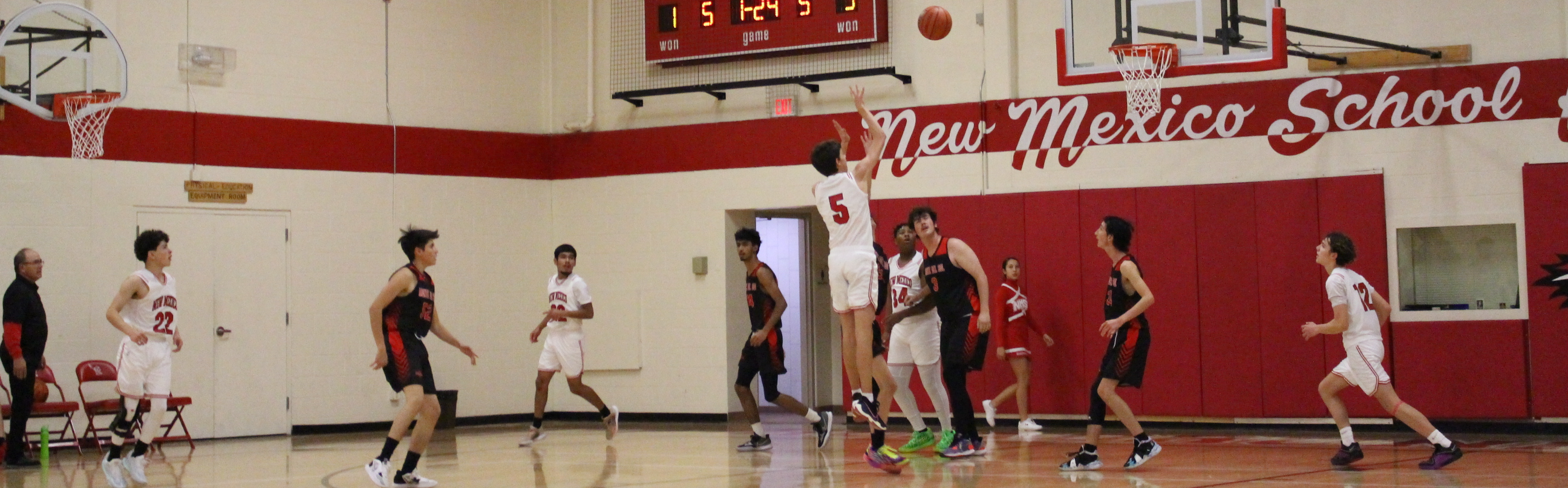 Varsity Boys Basketball Team during a home game